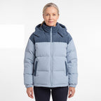 Cord Puffer Jacket för dam i ljusblå, kvinna framifrån mot vit bakgrund