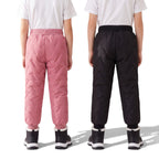 Kids' Fleece Pants i rosa och svart bakifrån, quiltade och vattenavvisande vinterbyxor